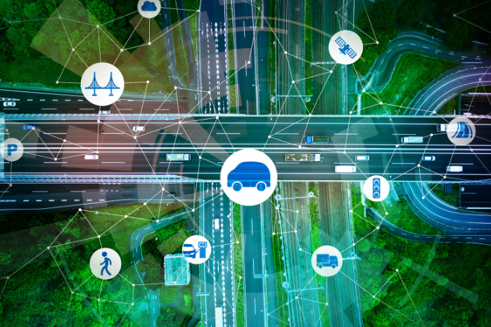 una carretera con elementos gráficos de sostenibilidad sobre ella